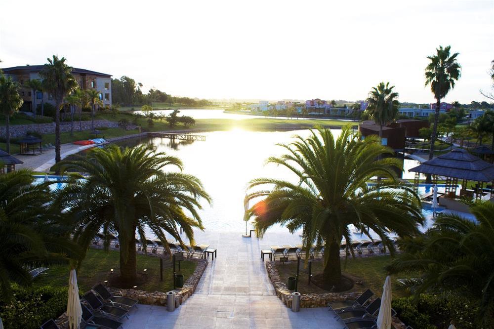 Sofitel La Reserva Cardales Río Luján Buitenkant foto Sunrise at the Village Green